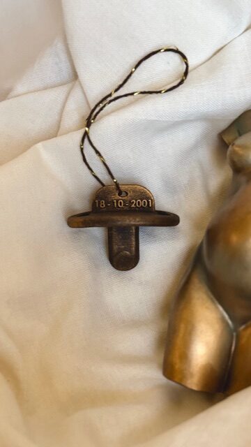 fopspeen met naam en geboortedatum